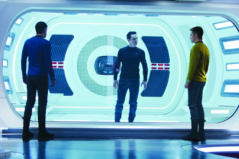 FILE - This undated publicity film image released by Paramount Pictures shows, from left, Zachary Quinto, as Spock, Benedict Cumberbatch as John Harrison, and Chris Pine as Kirk, in a scene in the film, 