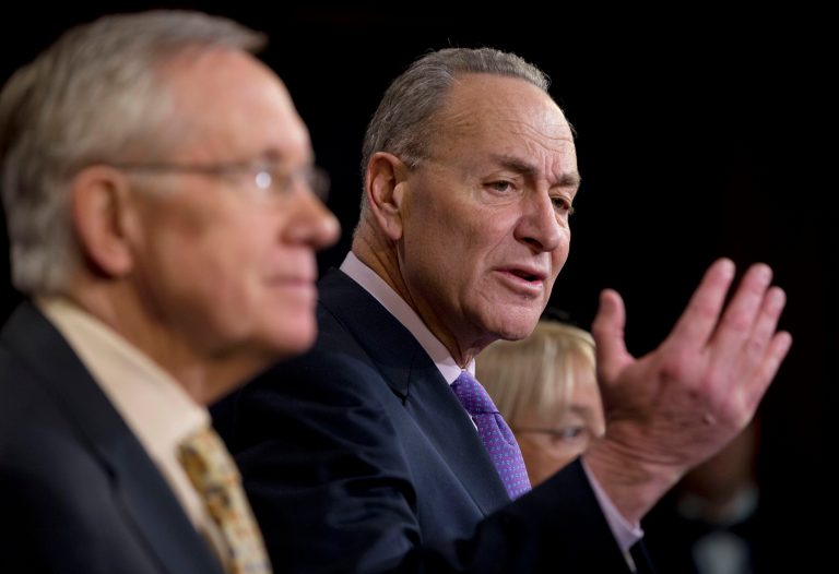 Sen. Charles Schumer, D-N.Y., right, flanked by Senate Majority Leader Harry Reid of Nevada, makes the case for extending unemployment insurance benefits, on Capitol Hill in Washington. (AP Photo/Pablo Martinez Monsivais)