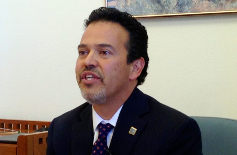 New Mexico state Rep. Carl Trujillo, a Santa Fe Democrat, announces a lawsuit filed on Wednesday May 14, 2014, in the state Supreme Court in Santa Fe, N.M., seeking to nullify a settlement between New Mexico, the federal government and the Navajo Nation over tribal rights to water in the San Juan River. Trujillo brought the lawsuit along with two Republican legislators and a farmer from northwestern New Mexico. (AP Photo/Barry Massey)