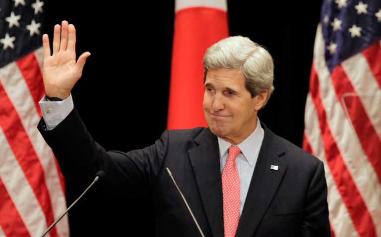 U.S. Secretary of State John Kerry waves after his lecture to students at Tokyo Institute of Technology in Tokyo Monday, April 15, 2013. Kerry is here as part of Asian tour amid a tense situation over a possible missile launch by North Korea. (AP Photo/Junji Kurokawa, Pool)