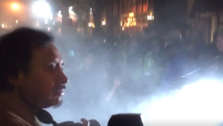 Police deployed mace and teargas, according to one person at the scene. (Screen shot)