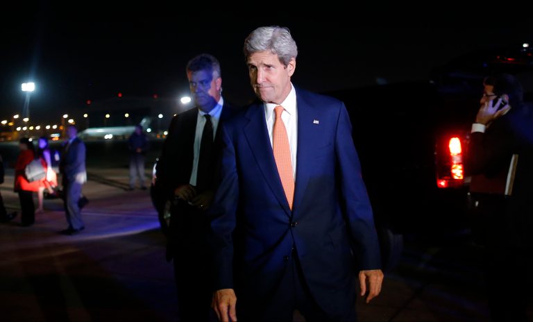 U.S. Secretary of State John Kerry boards his plane after his meeting with Israeli Prime Minister Benjamin Netanyahu in Tel Aviv, Israel, Wednesday, July 23, 2014. Kerry is meeting with United Nations Secretary-General Ban Ki-moon, Netanyahu, and Palestinian President Mahmoud Abbas as efforts for a cease-fire between Hamas and Israel continues. (AP Photo/Pool)