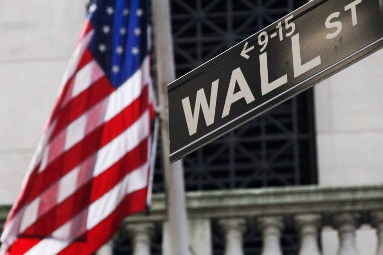 FILE - This Monday, July 15, 2013 file photo shows the American flag and Wall St. street sign outside the New York Stock Exchange, in New York. Stocks are opening higher on Wall Street Monday, May 12, 2014, sending major indexes to their latest all-time highs. (AP Photo/Mark Lennihan, File)