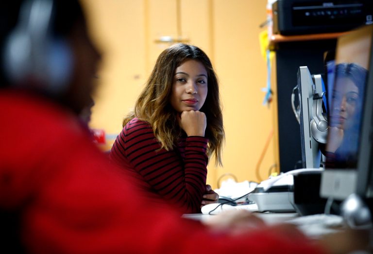 Andrea Aguilera sits at the Erie Neighborhood House in Chicago on Nov. 17. Aguilera, 20, a student at a suburban Chicago college, said she feels uncertain since the election. She was brought to the country illegally as a child and has been able to get a work permit and avoid deportation through the Deferred Action for Childhood Arrivals. (AP Photo/Nam Y. Huh)