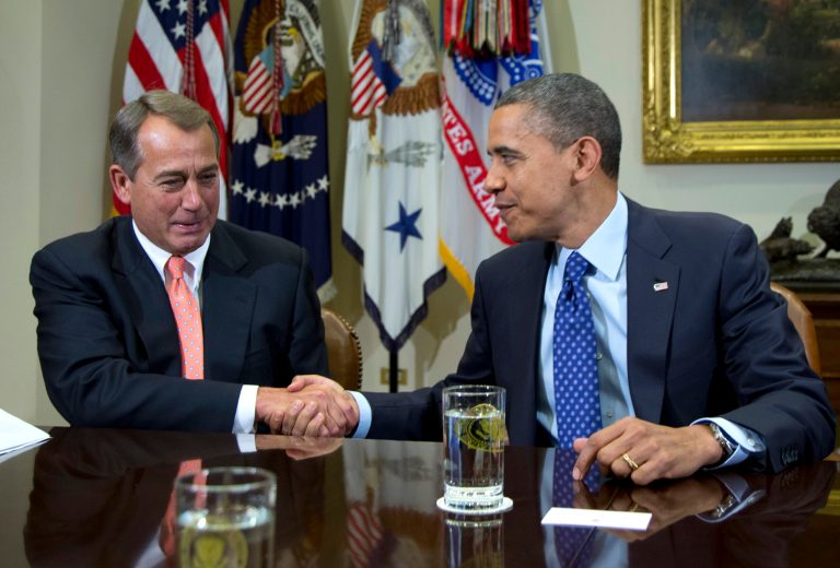  FILE - This Nov. 16, 2012 file photo shows President Barack Obama shaking hands with House Speaker John Boehner of Ohio in the Roosevelt Room of the White House in Washington, during a meeting to discuss the deficit and economy. Congress and the White House can significantly soften the initial impact of the âfiscal cliffâ even if they fail to reach a compromise by Dec. 31. One thing they cannot control, however, is the financial markets' reaction, which possibly could be a panicky sell-off that triggers economic reversals worldwide. The stock market's unpredictability is perhaps the biggest wild card in the political showdown over the fiscal cliff. (AP Photo/Carolyn Kaster, File)  