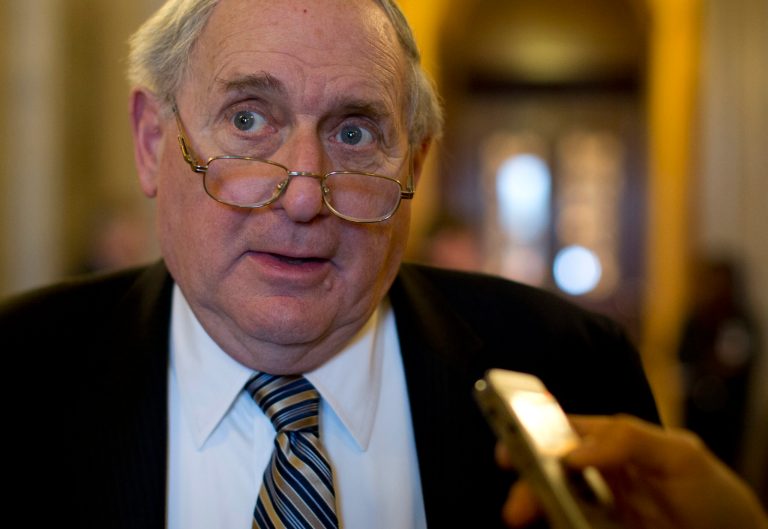 FILE - In this Feb. 26, 2013, file photo, Senate Armed Services Committee Chairman Sen. Carl Levin, D-Mich. speaks with reporters on Capitol Hill in Washington. Levin said Thursday, March 7, he will not seek re-election in 2014. He says he wants to do his job as Senate Armed Services chairman and as an advocate for his home state 