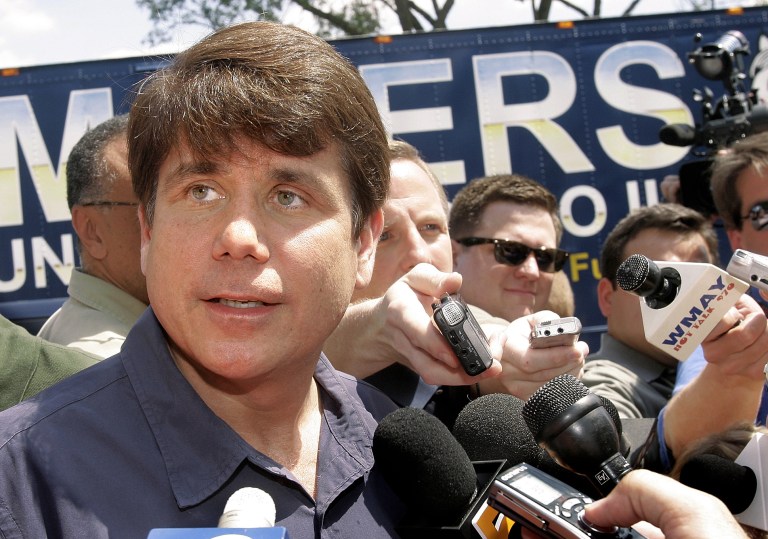 Illinois Gov. Rod Blagojevich is surrounded by reporters as he attends a rally at the Illinois State Fair in Springfield, Ill., Wednesday, Aug. 16, 2006. (AP Photo/Seth Perlman)