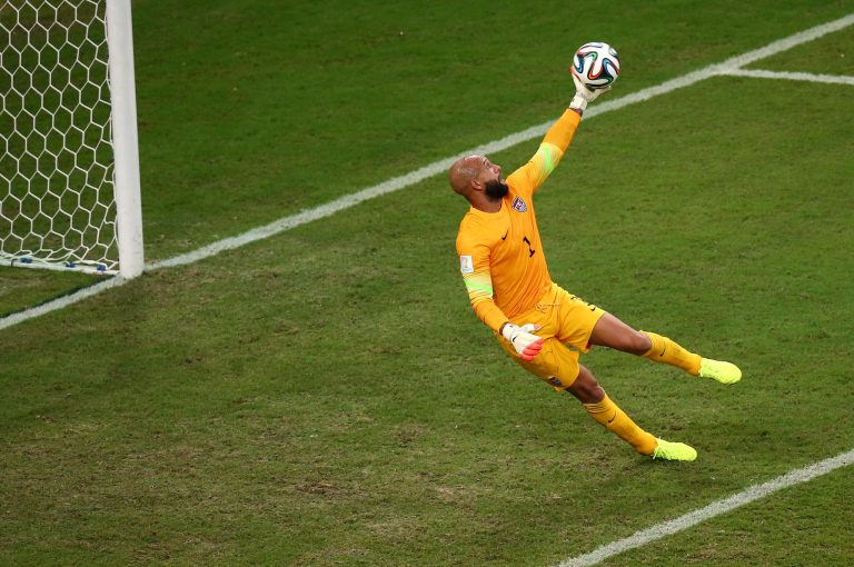 Tim Howard of the United States makes a save during the 2014 FIFA World Cup Brazil Group G match between the United States and Portugal at Arena Amazonia on June 22, 2014 in Manaus, Brazil. (Photo by Elsa/Getty Images)