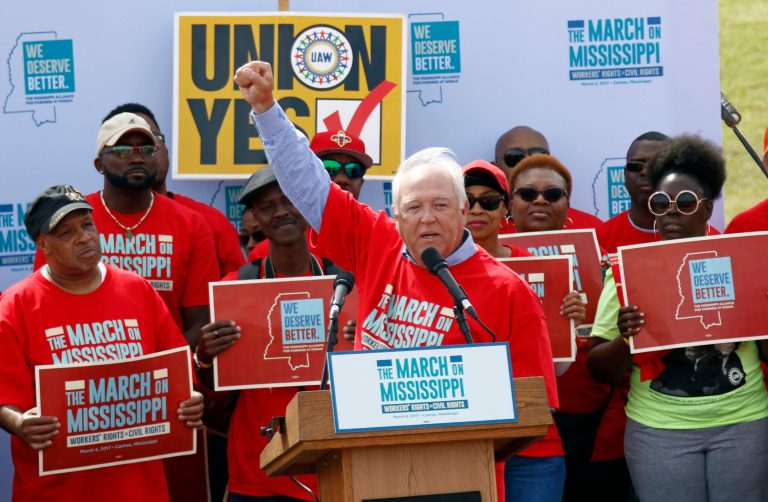 UAW president Dennis Williams calls for Nissan auto workers to demand their rights during a speech before thousands gathered at a pro-union rally near Nissan Motor Co.'s Canton, Miss., plant on March 4. The National Labor Relations Board on March 31 leveled new charges that Nissan Motor Co. and a contract worker agency at Nissan's Mississippi plant are violating workers' rights. (AP Photo/Rogelio V. Solis)