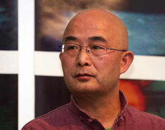 Chinese Author Escapes Repression