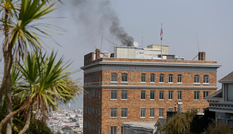 Black smoke rises from the roof of the Consulate-General of Russia Friday in San Francisco. The U.S. on Thursday ordered Russia to shut its San Francisco consulate and close offices in Washington and New York within 48 hours in response to Russia's decision last month to cut U.S. diplomatic staff in Russia. Fireman were called to the consul, but were turned away after being told there was no problem. (AP Photo/Eric Risberg)