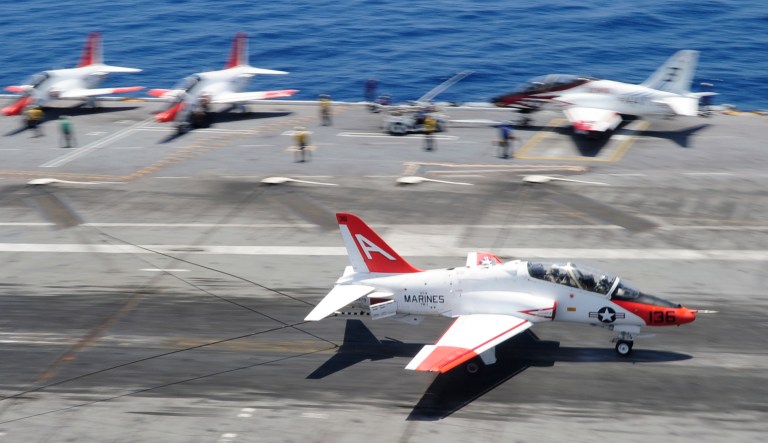A T-45C Goshawk lands on the flight deck of a U.S. aircraft carrier. A U.S. Navy T-45 training aircraft with an instructor pilot and student on board went missing over Tennessee Sunday. (U.S. Navy photo by Mass Communication Specialist Seaman Michael E. Wiese/Released)