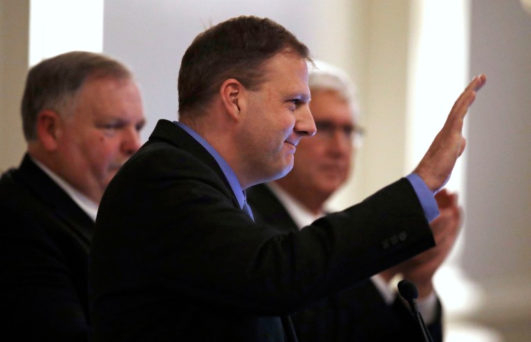 After Sununu's signature, New Hampshire became the 12th state to do away with licensing requirements.er, left. (AP Photo/Charles Krupa)