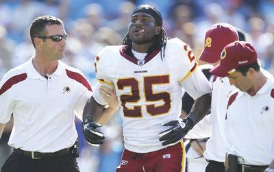Scott Halleran/Getty Images
Tim Hightower injured his knee against the Panthers and will have an MRI on Monday to determine the severity of the injury.