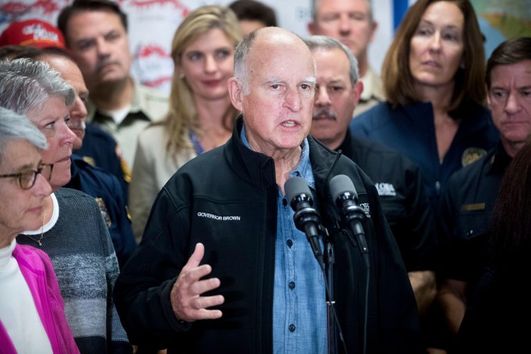 California Gov. Jerry Brown discusses the Thomas fire and the extended length of the state's fire season during a press conference on Saturday, Dec. 9, 2017, in Ventura, Calif. (AP Photo/Noah Berger)