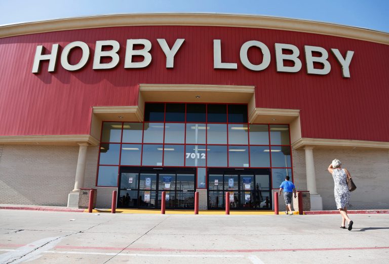 FILE - This June 30, 2014, file photo shows customers walking into a Hobby Lobby store in Oklahoma City. There may be more to that 