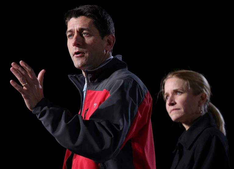 WEST CHESTER, OH - NOVEMBER 02:  Republican vice presidential candidate, U.S. Rep. Paul Ryan (R-WI) (L) speaks as his wife Janna Ryan looks on during a campaign rally at The Square at Union Centre on November 2, 2012 in West Chester, Ohio. With less than one week to go before election day, Mitt Romney is campaigning in Wisconsin and Ohio.  (Photo by Justin Sullivan/Getty Images)