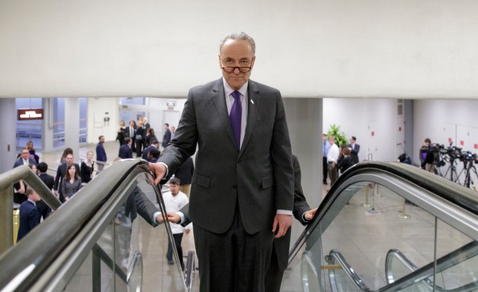President is considering withholding payments to insurers in an attempt to twist Democrats' arms. (AP Photo/J. Scott Applewhite)