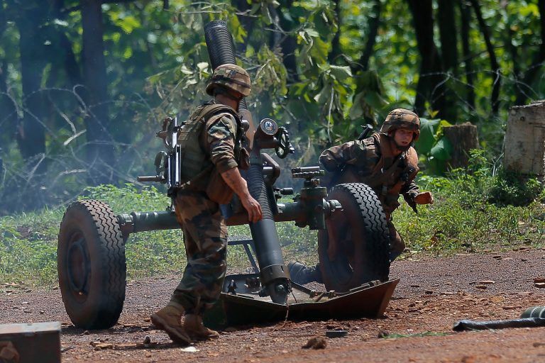 French Sangaris forces fire warning flares with a 120mm mortar against ex-Seleka elements  in  Bamberi, Central African Republic, Saturday May 24, 2014. Following at exchange of fire, a French combat helicopter fired a rocket and destroyed an ex-Seleka pickup. (AP Photo/Jerome Delay) ONLINE OUT FRANCE OUT