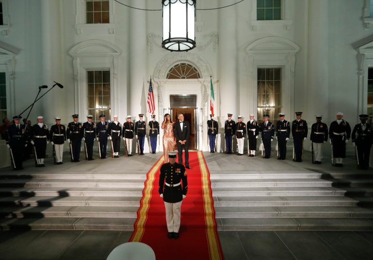 President Barack Obama and first lady Michelle Obama wait to greet Italian Prime Minister Matteo Renzi and his wife Agnese Landini on the North Portico for a State Dinner at the White House in Washington, Tuesday, Oct. 18, 2016. (AP Photo/Pablo Martinez Monsivais)