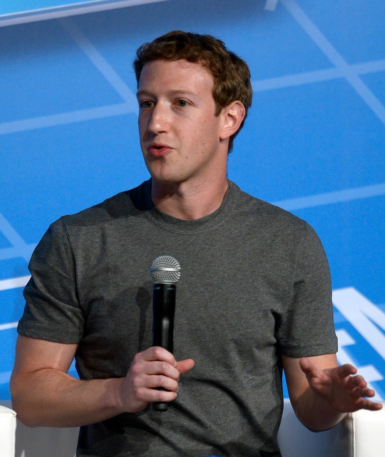 Mark Zuckerberg Chairman and CEO of Facebook speaks during a conference at the Mobile World Congress, the world's largest mobile phone trade show in Barcelona, Spain, Monday, Feb. 24, 2014. Expected highlights include major product launches from Samsung and other phone makers, along with a keynote address by Facebook founder and chief executive Mark Zuckerberg. (AP Photo/Manu Fernandez)