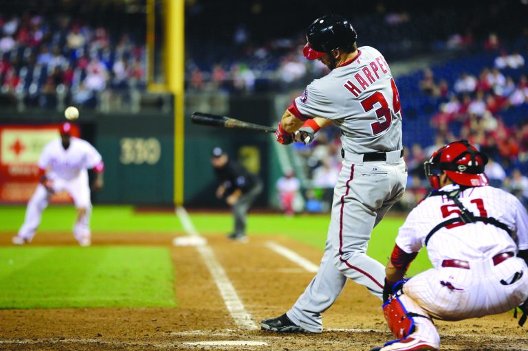 Matt Slocum/AP
Bryce Harper became the second teenager in history to hit 20 home runs and later added his ninth triple of the season.
