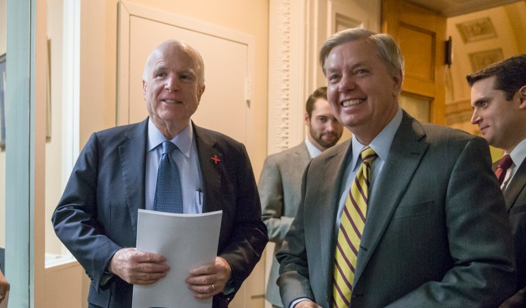 Sens. John McCain, R-Ariz., and Lindsey Graham, R-S.C., are spending the last of the August recess at a meeting in northern Italy. (AP Photo/J. Scott Applewhite)