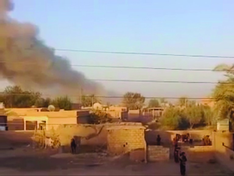This image made from video provided by Deir Press Network and accessed by AP video on Thursday, Aug. 23, 2012 purports to show smoke rising after a bombing in Deir El-Zour, Syria. Across the country, scores of people died in shelling and clashes, according to the Britain-based Syrian Observatory for Human Rights and the Local Coordination Committees. The bloodshed coincided with the departure from the Syrian capital on Thursday of the last of the United Nations military observers after their mission headed by former U.N. Secretary General Kofi Annan, meant to help end the bloodshed in Syria, failed. (AP Photo/Deir Press Network via AP video) THE ASSOCIATED PRESS HAS NO WAY OF INDEPENDENTLY VERIFYING THE CONTENT, LOCATION OR DATE OF THIS PICTURE.