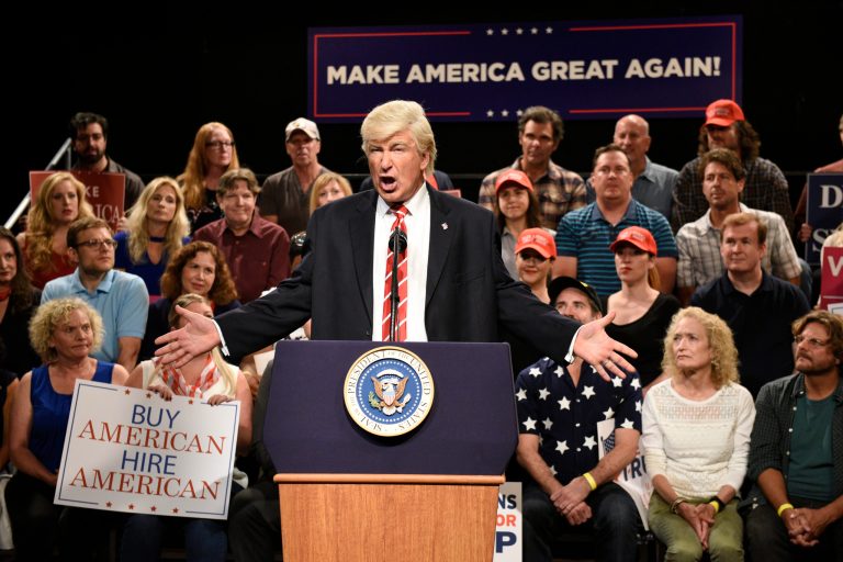 In this Aug. 24, 2017, photo provided by NBC, Alec Baldwin performs his impression of President Donald Trump on the set of 