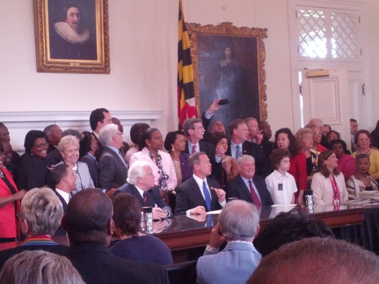 Maryland Gov. Martin O'Malley and legislative leaders surrounded by lawmakers and advocates during the signing of the death penalty repeal bill. (Andy Brownfield/Washington Examiner)