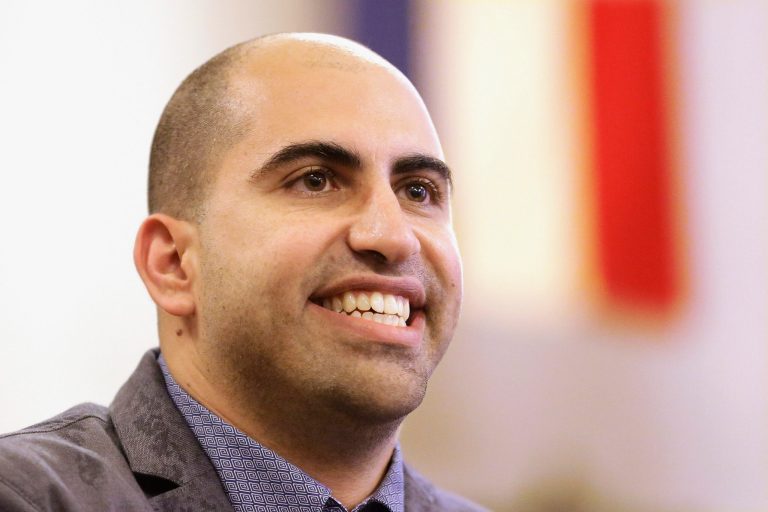 In this Sept. 9, 2014 file photo, Steve Salaita, a professor who lost a job offer from the University of Illinois over dozens of profane Twitter messages that critics deemed anti-Semitic, speaks to students and reporters during a news conference at the campus in Champaign Ill. (AP Photo/Seth Perlman, File)