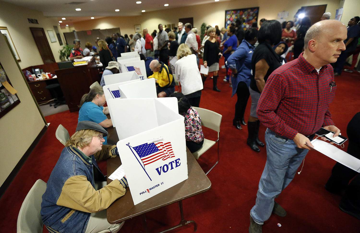 Millions stay home, allowing Trump to win with fewer votes than Romney
