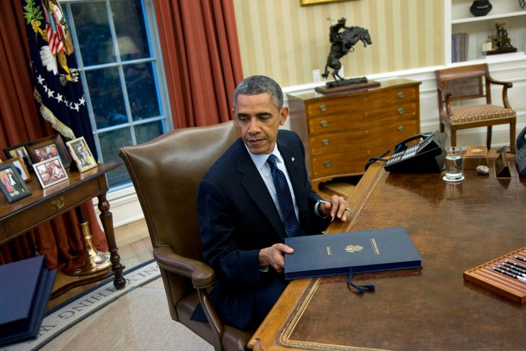 President Obama has yet to make good on a promise an administration official made that he would sign up for health insurance on the new government exchanges, the White House acknowledged. (AP/ Evan Vucci)