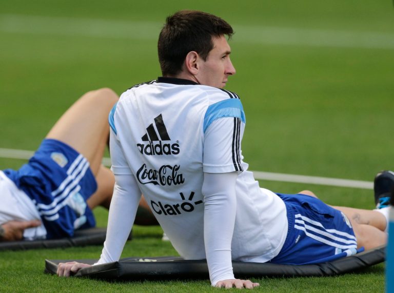 Argentina's Lionel Messi sits during a training session in Vespesiano, near Belo Horizonte, Brazil, Thursday, July 10, 2014. On Sunday, Argentina faces Germany for the World Cup final soccer match in Rio de Janeiro. (AP Photo/Victor R. Caivano)
