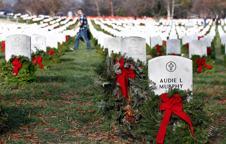 Wreaths Across America has collected sponsorships for about 126,800 wreaths as of Tuesday, but it needs 245,000 to cover every grave at Arlington. (AP Photo)