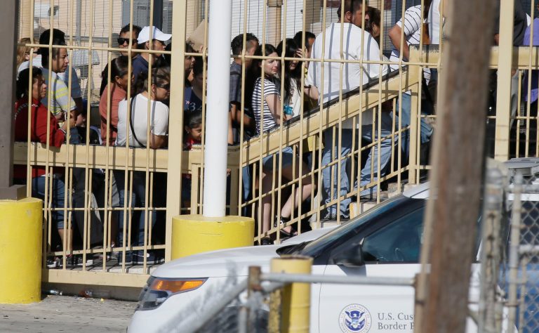 Pedestrians wait in line to enter the U.S. from Mexico in Laredo, Texas, across the Rio Grande from Nuevo Laredo, Tamaulipas, Thursday, July 23, 2015. (AP Photo)Â 