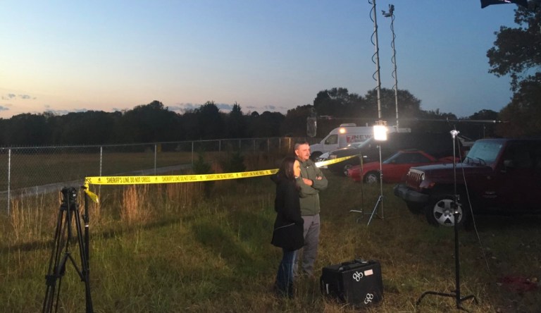 According to a photograph obtained by CNNMoney, the yellow police tape behind ABC News correspondent Linsey Davis was tied to the organization's own equipment just off-camera, to give the appearance that they were standing near the crime scene. (Courtesy of Dylan Byers of CNN, via Twitter)