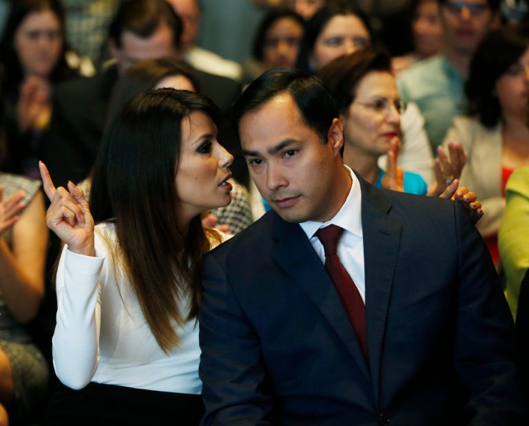 Actress Eva Longoria speaks with Rep. Joaquin Castro, D-Texas, at an event launching The Latino Victory Project, a Latino political action committee, at the National Press Club in Washington, Monday, May 5, 2014. (AP Photo/Charles Dharapak)