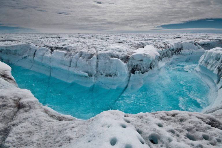 Surface melt water rushes along the surface of the Greeland Ice Sheet, through a supra-glacial stream channel, in July 2012 in the southwest of Ilulissat, Greenland. Polar ice sheets are now melting three times faster than in the 1990s, but so far it's added just less than half an inch to already rising global sea levels. (AP Photo/Ian Joughin)