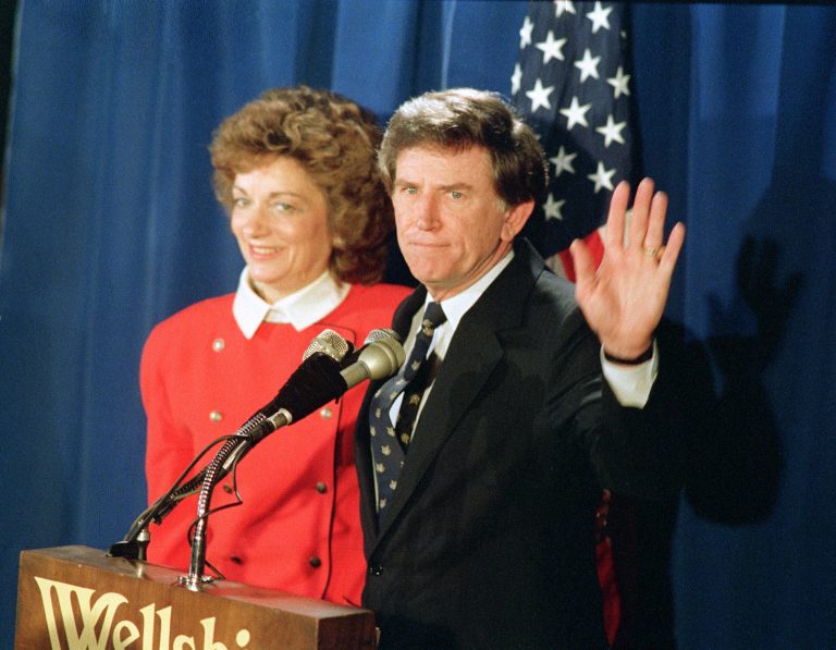 In this March 11, 1988 photo, Gary Hart waves to supporters at a news conference in Denver, after again announcing he would withdraw from the presidential race. (AP File Photo)