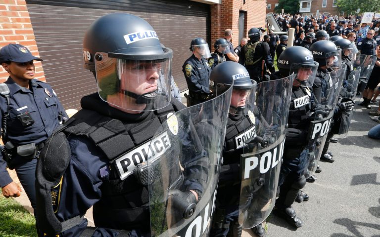 Local authorities declared a state of emergency before a rally of neo-Nazis, neo-Confederates, and other white supremacist groups started in Charlottesville, Va. Saturday morning following clashes between those groups and counter-protesters. (AP Photo/Steve Helber)