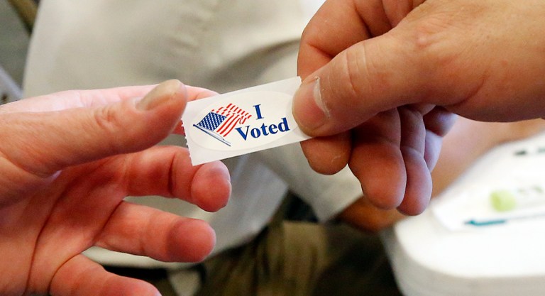 Indiana voters will have their say in the Republican and Democratic presidential primaries Tuesday, with both front-runners inching toward clinching their nominations. (AP Photo/Rogelio V. Solis)