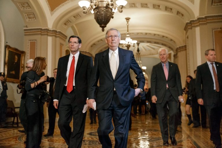 Senate Minority Leader Mitch McConnell, R-Ky., center, flanked by Sen. John Barrasso, R-Wyo., Republican Policy Committee chairman, left, and Senate Minority Whip John Cornyn, R-Texas, right, arrives to speak with reporters following a GOP policy lunch at the Capitol Tuesday. Republicans are increasingly optimistic that they can tilt enough seats to capture the Senate majority for the first time since the 2006 elections. (AP Photo/J. Scott Applewhite)
