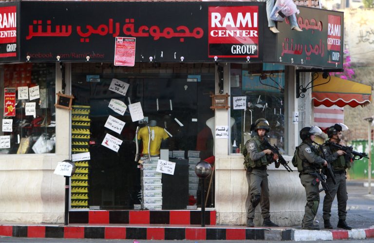 Israeli soldiers search for three missing Israeli teens believed to have been abducted in the West Bank city of Jenin, Thursday, June 19, 2014. Since the operation to locate the teens began a week ago, about 280 Palestinians have been arrested, the military said, including 200 members of Hamas. (AP Photo/Mohammed Ballas)