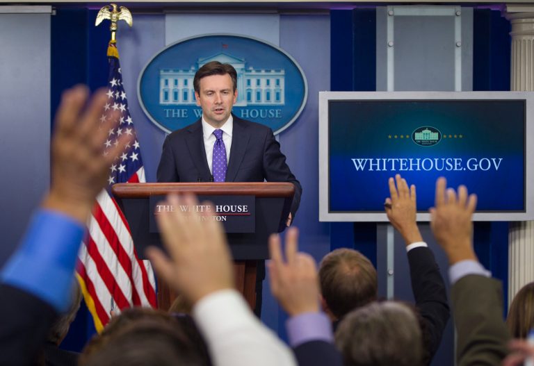 Members of the Press Corps raise their hands as White House Press secretary Josh Earnest answers questions during the daily briefing in the Brady Press Briefing Room of the White House, Monday, July 13, 2015. (AP Photo/Pablo Martinez Monsivais)