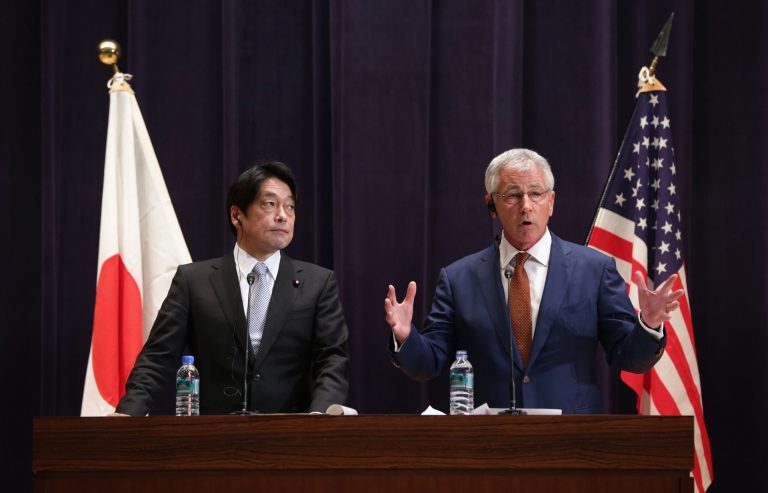 U.S. Secretary of Defense Chuck Hagel and Japanese Defense Minister Itsunori Onodera participate in a joint news conference at the Japanese Ministry of Defense headquarters Sunday April 6, 2014 in Tokyo, Japan. Secretary Hagel announced that the U.S. is planning to forward-deploy two additional AEGIS ballistic missile defense ships to Japan by 2017.  (AP Photo/Alex Wong/POOL)