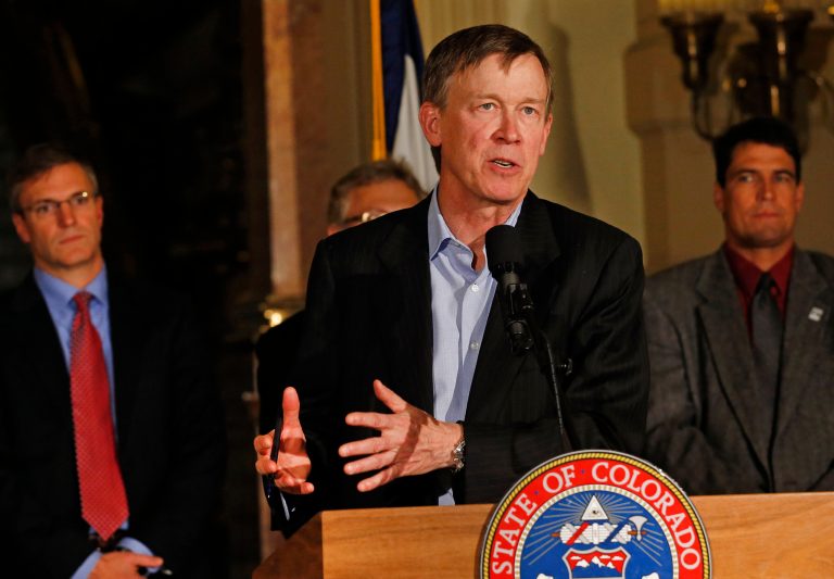Colorado Gov. John Hickenlooper speaks to members of the media during a news conference at the state Capitol in Denver, at which he discussed the state's new proposed standards for methane emissions and other heightened safeguards. The proposed rules would include a system of infrared cameras to speed detection of leaks from tanks and pipelines. (AP Photo/Brennan Linsley)
