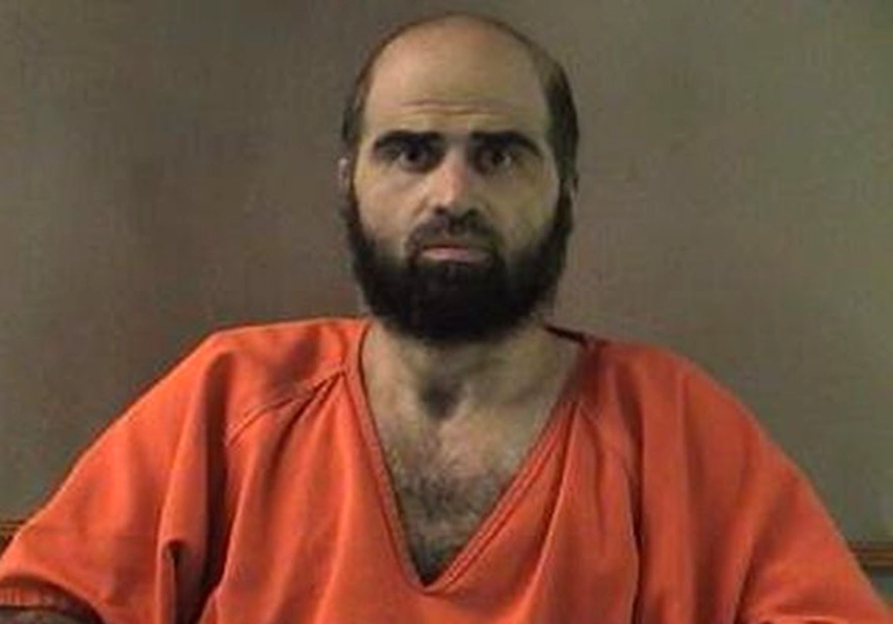 Judge stalls decision on delaying Fort Hood trial