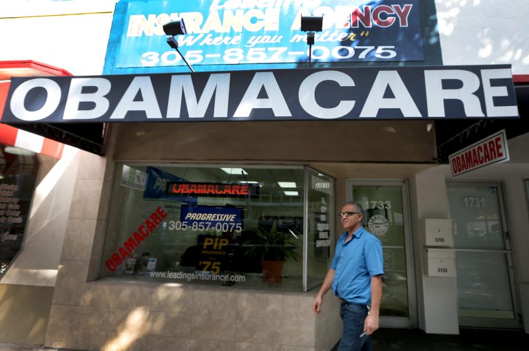 Hisham Uadadeh walks out of Leading Insurance Agency after enrolling in a health insurance plan under the Affordable Care Act on February 13, 2014 in Miami, Florida. (Photo by Joe Raedle/Getty Images)