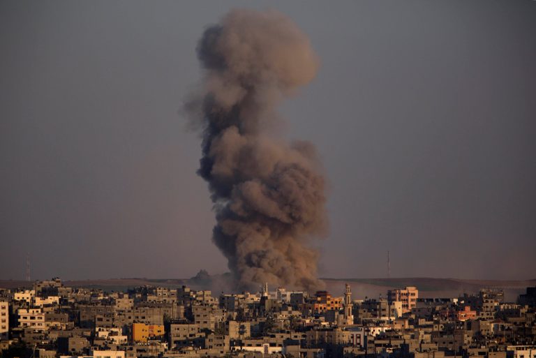Smoke rises after an Israeli airstrike in Gaza City, Sunday, Aug. 3, 2014. (AP Photo/Dusan Vranic)